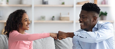 Counselor working with a young patient, representing the online EdD in Mental Health Counseling program at American International