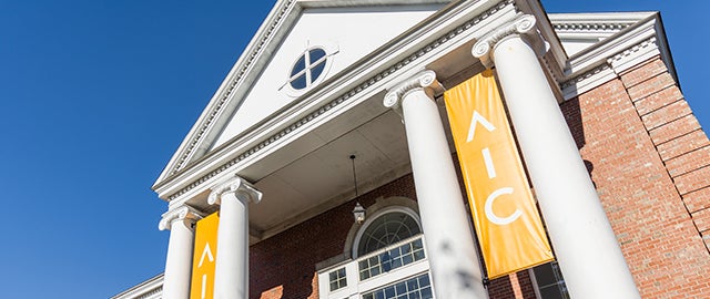 Campus building at American International College, now offering online Counseling programs and online OTD program