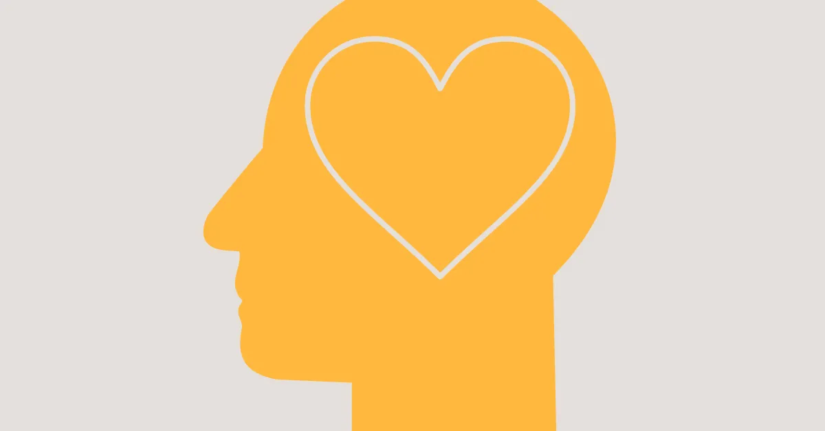 silhouette of a side profile head with a heart outline in the image